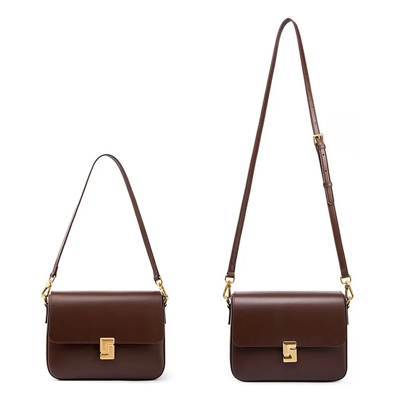 Two brown handbags with gold hardware on a white background