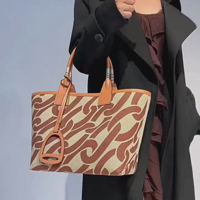 brown handbag video
